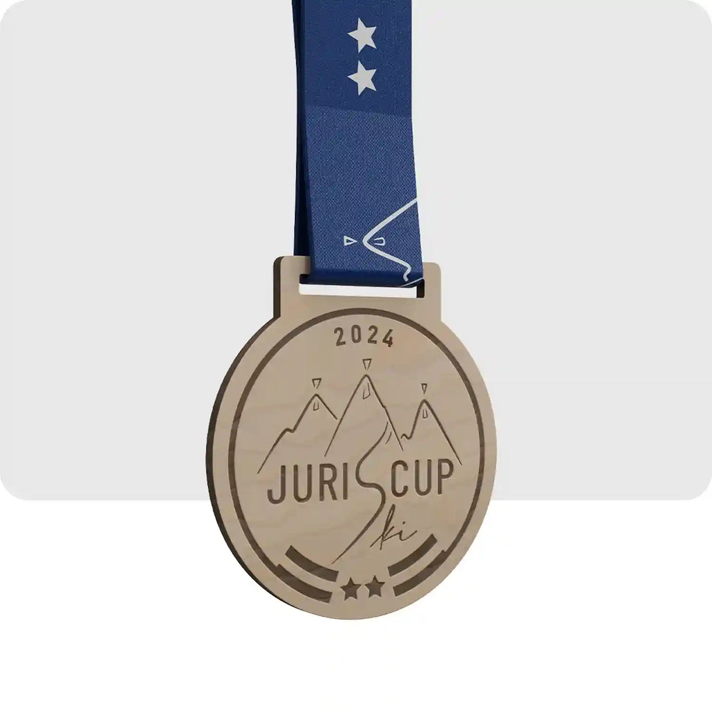 Médaille en bois avec gravure laser pour la prestigieuse compétition de ski "JurisCup"