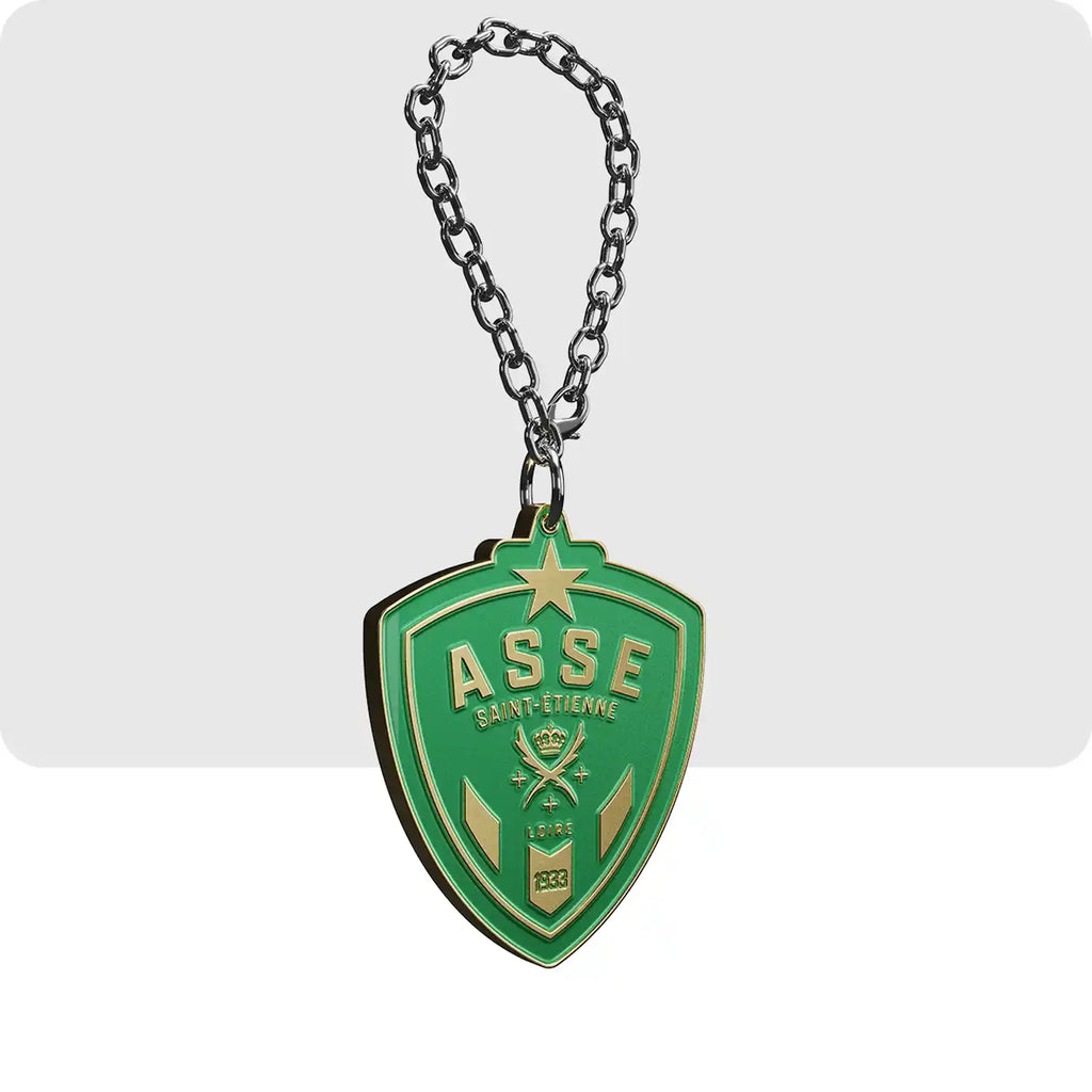 Porte clé gravé de couleur vert et doré  représentant le logo du club de football de l'ASSE.